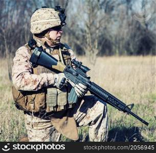 US marine with assault rifle during the military operation