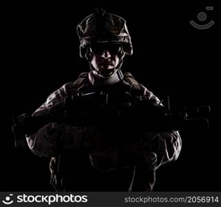 US marine with the rifle on black background