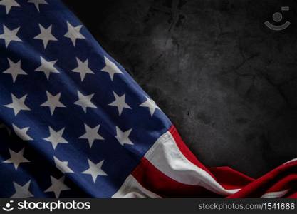 USA Flag Lying on Cement Background. American Symbolic. 4th of July or Memorial Day of United States. Copy Space for Text