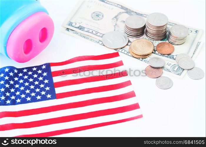 USA flag, stack of coins and dollors, Travel America concept