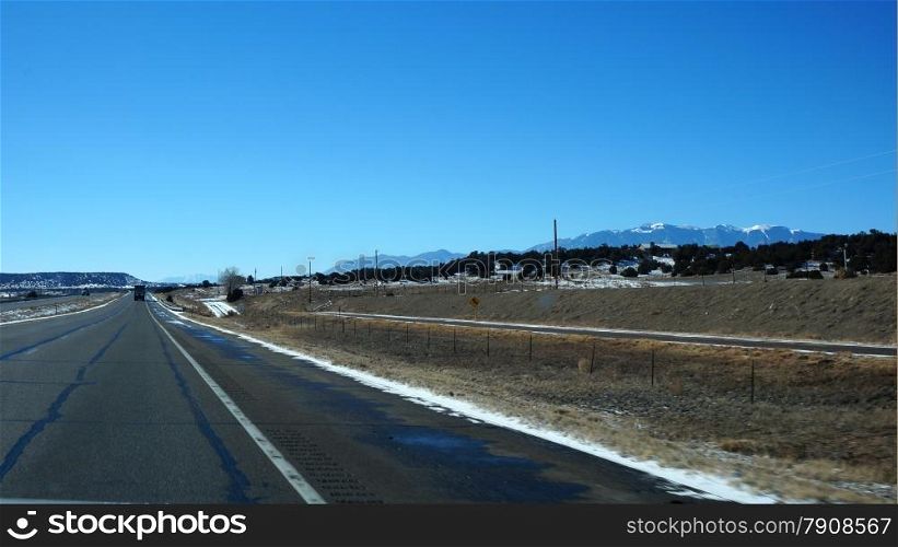 USA highway with blue sky in the winter. USA highway in the winter