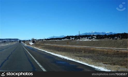 USA highway with blue sky in the winter. USA highway in the winter