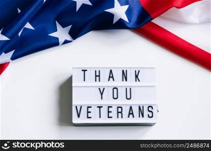 USA Memorial Day concept. American flag and inscription Thank you veterans on a white background.. USA Memorial Day concept. American flag and inscription Thank you veterans on white background.