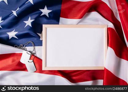 USA Memorial Day concept. Empty frame for text and American flag. Military dog tags.. Memorial Day concept. Empty frame for text and American flag. Military dog tags.