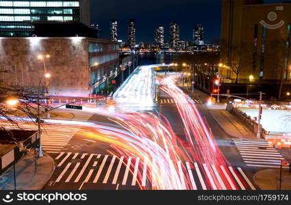 USA. New York City. Transport interchange at the corner of 1st Avenue and E 42 street. Night. Traffic Intersection at Night