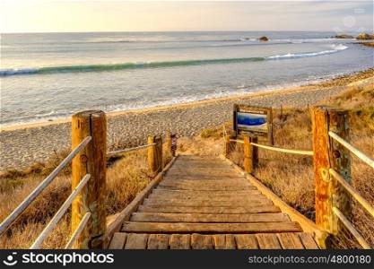 USA Pacific coast landscape, boardwalk to Leo Carrillo State Beach, Malibu, California.