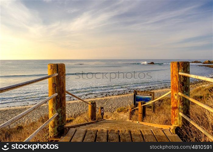 USA Pacific coast landscape, boardwalk to Leo Carrillo State Beach, Malibu, California.