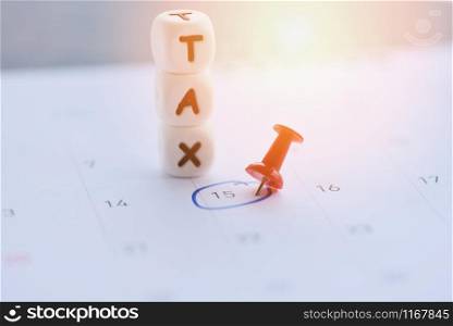 USA tax due date marked on calendar 15 April / tax day concept tax payment Government taxes