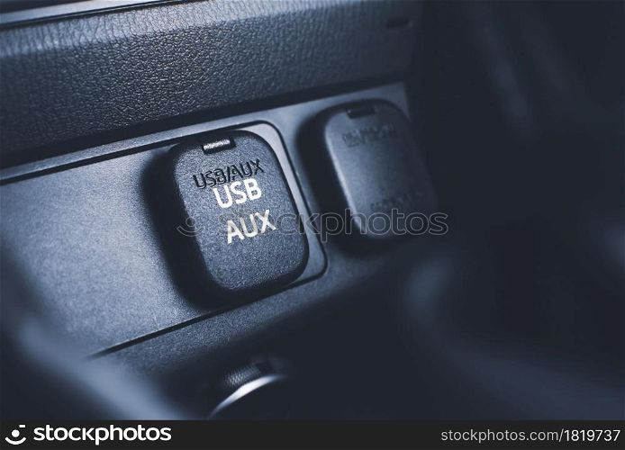 USB and AUX port connector on console panel in the car