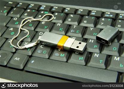 usb flash drive on keyboard
