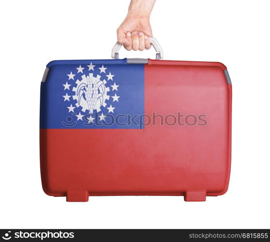 Used plastic suitcase with stains and scratches, printed with flag, Myanmar