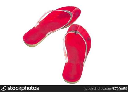Used red flip flop shoes isolated on white background&#xA;