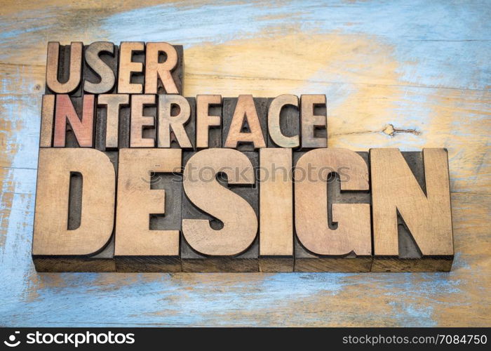 User interface design word abstract in letterpress wood type printing blocks against grunge wooden surface