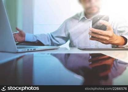 usiness concept.Businessman working stock exchange project modern office.Laptop computer digital table and smart phone.Internet connection technology.Finance graphics interface.Double exposure effect photo, Horizontal 