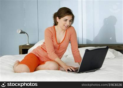 Using a laptop in bed