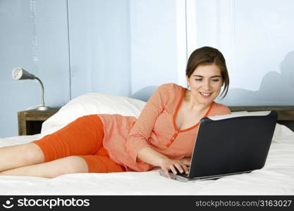 Using a laptop in bed