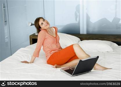 Using a laptop in bed