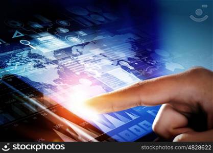 Using innovative technologies. Hand of businessman touching with finger media screen