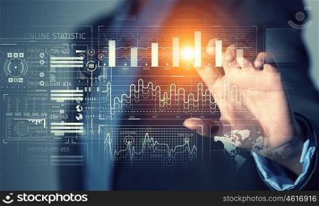 Using innovative technologies. Hand of businesswoman pressing icon on virtual screen