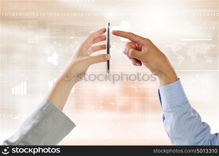 Using mobile phone. Close up of people hands using mobile phone