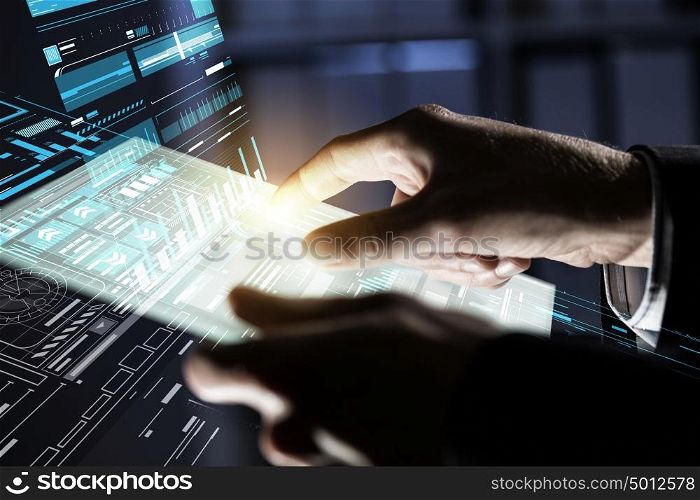 Using modern technologies. Close up of human hands using virtual panel