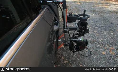 Using rig for the shots with the camera mounted on the outside of the car