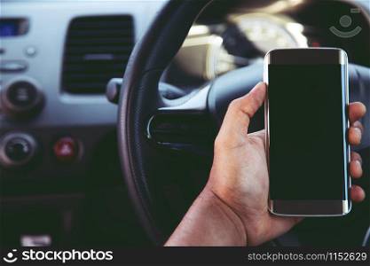 using smart phone mobile phone in car.