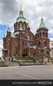 Uspenski Cathedral in the city of Helsinki in Finland. The Cathedral is on a hillside on the Katajanokka peninsula overlooking Helsinki. Designed by the Russian architect Aleksey Gornostayev (1808a??1862), it was completed in 1868 after his death.