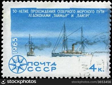 USSR - CIRCA 1965: stamp printed in USSR shows a Icebreakers with inscription  Passing of Northern Sea Route icebreakers Taimyr and Vaigach&acute; from series &acute;Investigation Arctic & Antarctic&acute;, circa 1965