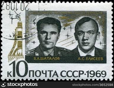 USSR - CIRCA 1969: A stamp printed in Russia, shows portraits Russian astronauts of V.A. Shatalov and A.S.Eliseev, series, circa 1969