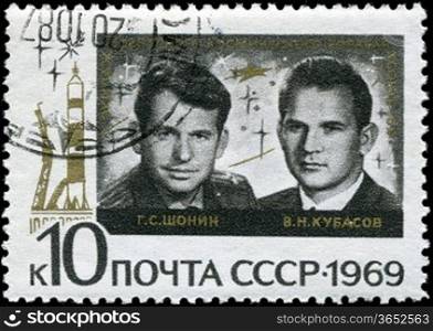 USSR - CIRCA 1969: A Stamp printed in the USSR shows the crew of the Soviet spaceship &acute;Union&acute; G.S.Shonin, V.N.Kubasov, circa 1969