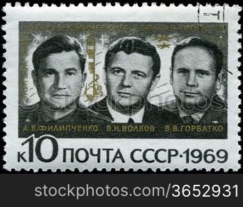 USSR - CIRCA 1969: A Stamp printed in the USSR shows the crew of the Soviet spaceship &acute;Union&acute; A.E.Filipchenko, V.N.Volkov, V.V. Gorbatko, circa 1969
