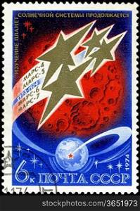 USSR - CIRCA 1974: A Postage Stamp Shows the Space Stations Mars over Planet Mars, circa 1974