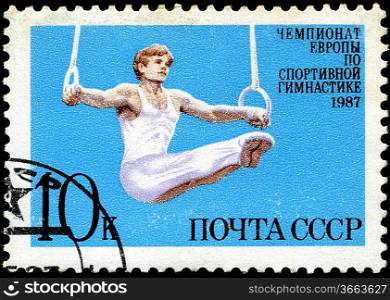 USSR - CIRCA 1987: a stamp printed by USSR shows gymnast, European Gymnastics Championships, Moscow 1987, circa 1987