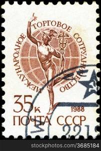 USSR - CIRCA 1988: A stamp printed in USSR shows The international trade cooperation, series &acute;Emblem&acute; , circa 1988