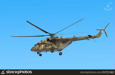 USSURIISK, RUSSIA - MARCH 24: Mi-8 military transport helicopter hovers on the competition skydivers on March 24, 2012 in Ussuriisk, Russia.