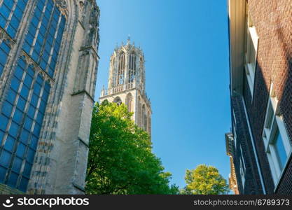 Utrecht. Ancient tower on a sunny day.. Old medieval tower in the historic center of Utrecht. Holland.