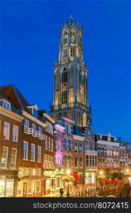 Utrecht. Old tower at night.. Quay Vismarkt and Domtoren in night light. Utrecht. Holland.