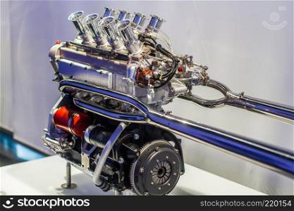V8 sport engine with polished exhaust and throttles