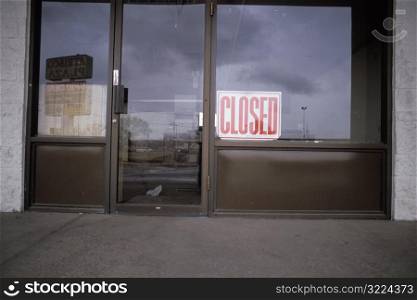 Vacant Department Store With Closed Sign In Window