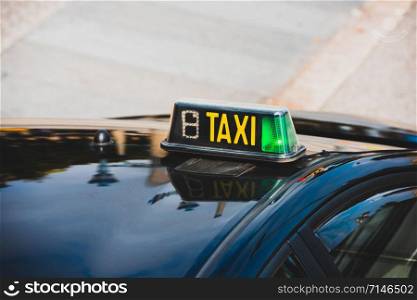 Vacant taxi detail, Barcelona, Spain. Horizontal shot