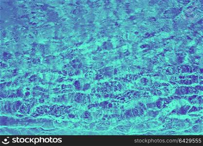 vacation and background concept - ultra violet and blue duotone water in pool or sea. ultra violet and blue duotone water in pool or sea