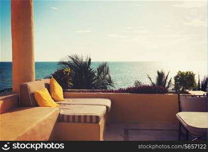 vacation, home and travel concept - sea view from balcony of home or hotel room