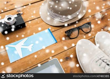 vacation, travel, tourism, winter holidays and objects concept - gadgets and traveler personal stuff