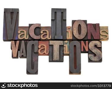 vacations word abstract in antique letterpress printing blocks of different size and style