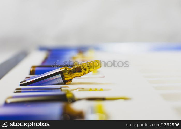 Vaccine ampoule isolated in a box set for injection mixed,Corona virus treatment concept,Covid-19.