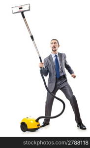 Vacuum cleaning by businessman on white