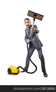 Vacuum cleaning by businessman on white