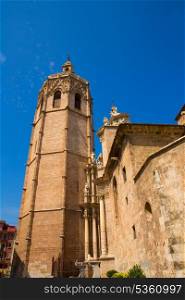 Valencia Cathedral facade and Miguelete Micalet in Plaza de la Reina at Spain