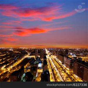 Valencia city skyline at sunset lights aerial in Spain